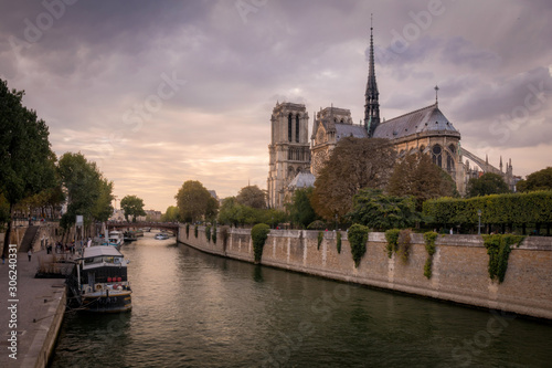 Seine and romantic cathedral Notre Dame at the sunset, Paris, France © Kennymax