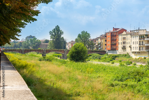 Parma, Italy. Parma river and Bridge in the city on a summer day