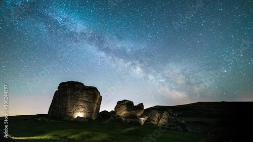 Milky Way Stars Time Lapse over Bonehill Rocks, Dartmoor National Park  photo