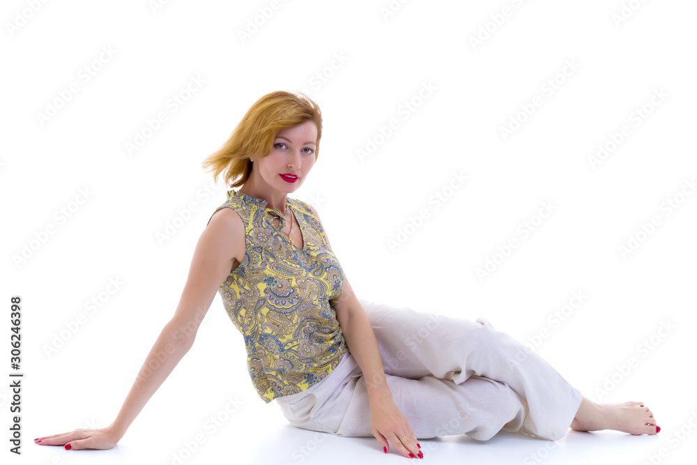 studio fashion portrait of beautiful young woman, sitting, on wh studio fashion portrait of beautiful young woman, sitting, on wh