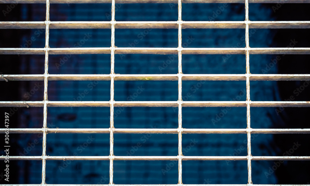 Metal grid with water under it Metal grid with water under it