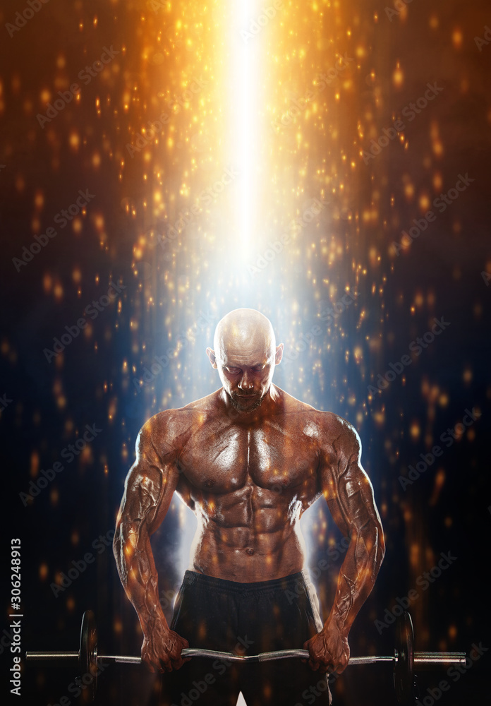 Fit athlete man with barbell in fire. Energy and power. Strong muscular guy bodybuilder. Sport and fitness motivation. Individual sports recreation.