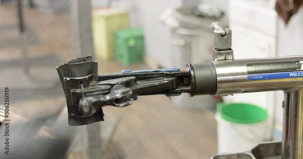 Extreme Close Up - A bike rack is tightened around a mounted bicycle - shot on RED Extreme Close Up - A bike rack is tightened around a mounted bicycle - shot on RED