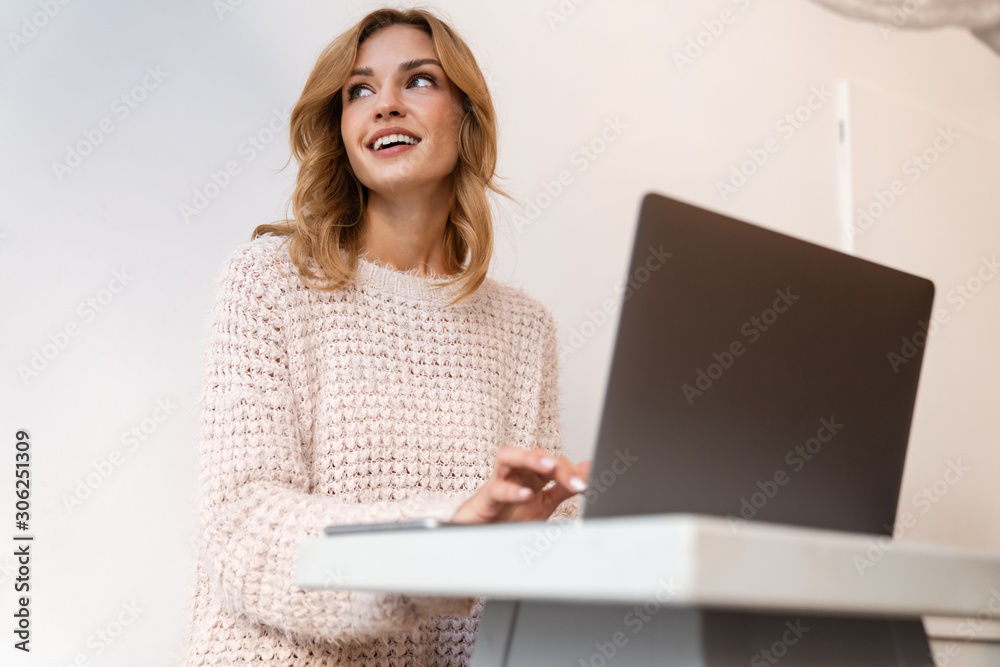 Positive cheery young blonde woman sit in cafe Positive cheery young blonde woman sit in cafe