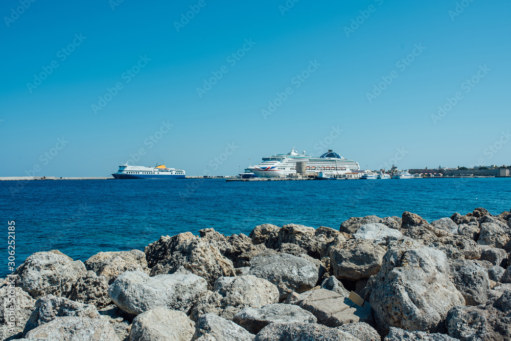Cruise liners in the port of Rhodes Island, Greece. Crossing of the Aegean and Mediterranean Seas.