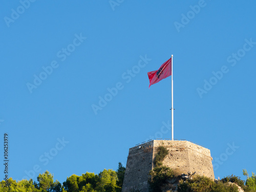 Unfurled Albanian Flag Flying at Berati Castle