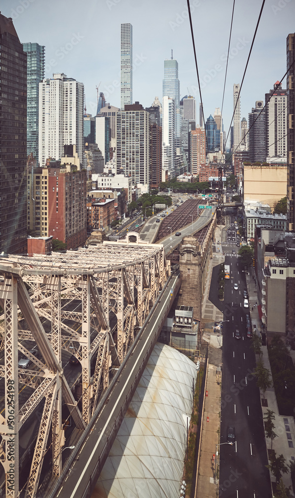 Obraz premium Retro toned picture of Queensboro Bridge and Manhattan skyline, New York City, USA..