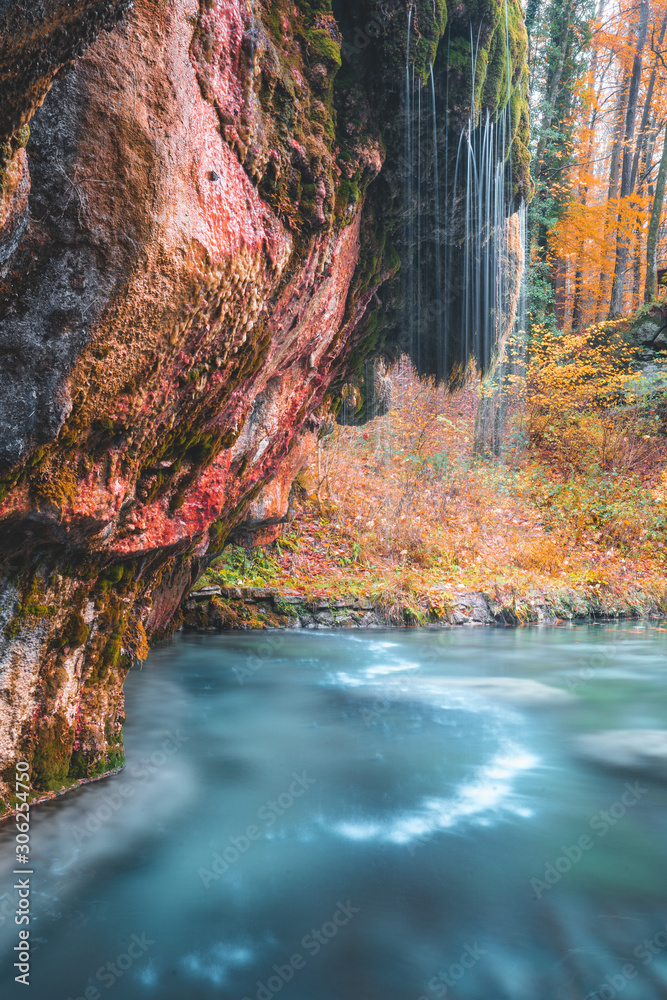 Kallektuffquell waterfall on Mullerthal trail in Luxembourg longexposure crystal clear water autumn fall in November Kallektuffquell waterfall on Mullerthal trail in Luxembourg longexposure crystal clear water autumn fall in November