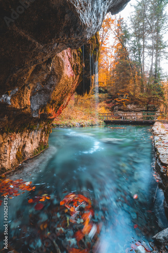 Kallektuffquell waterfall on Mullerthal trail in Luxembourg longexposure crystal clear water autumn fall in November