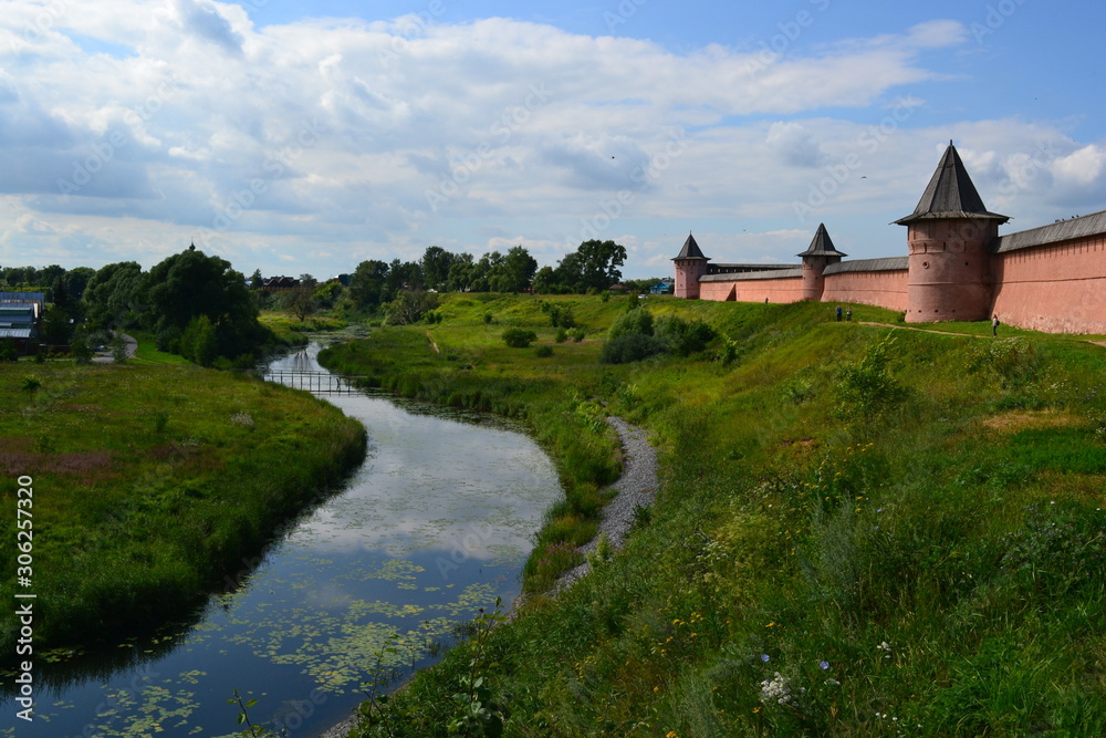 Old castle in Suzdal Russia, river, nature