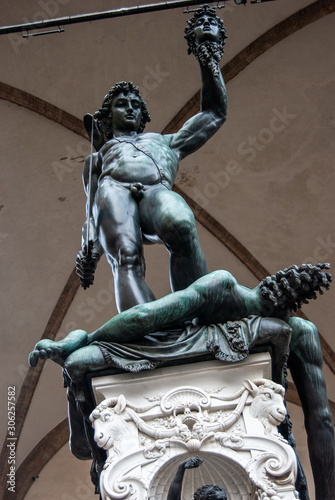 Florence, Italy - Perseus defeats Medusa sculpture, made by Benvenuto Cellini and located in Loggia dei Lanzi, in Piazza della Signoria