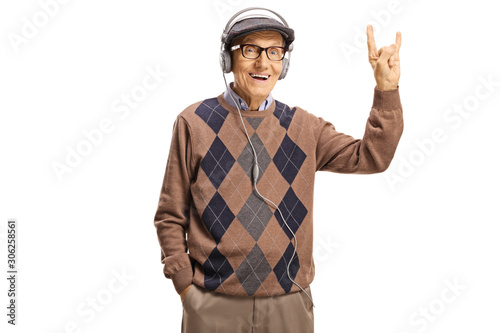 Elderly gentleman with headphones making a rock and roll sign