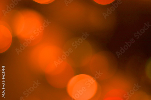 Defocused background with orange circles. Copy space © Postmodern Studio