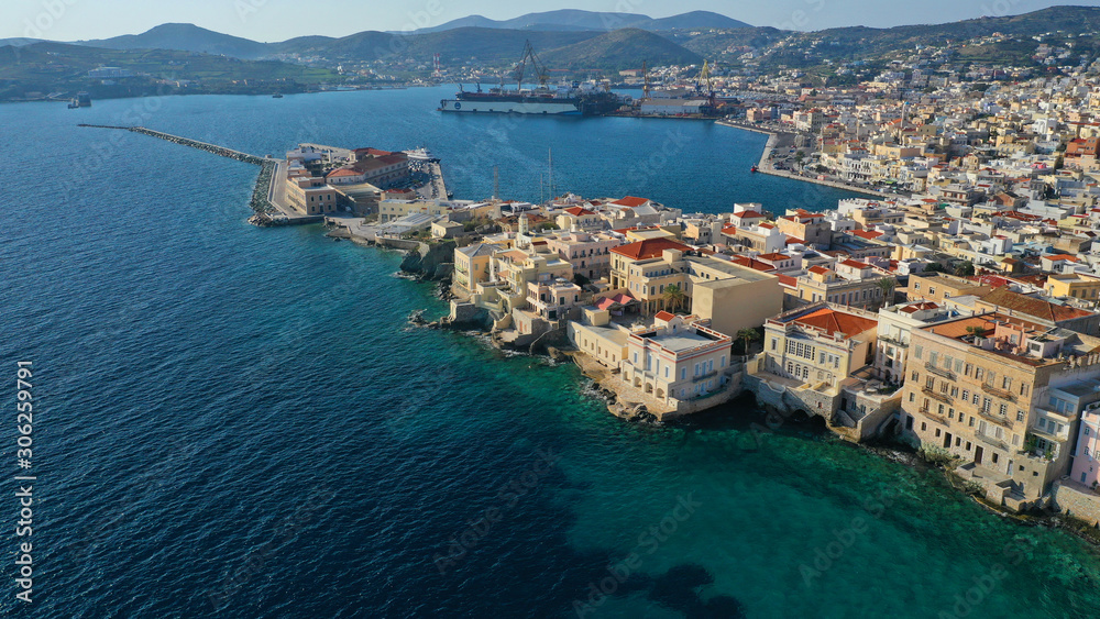 Aerial drone photo of pictruesque district built by the sea of Vaporia in main town of Syros or Siros island Ermoupolis near famous church of Agios Nikolaos, Cyclades, Greece