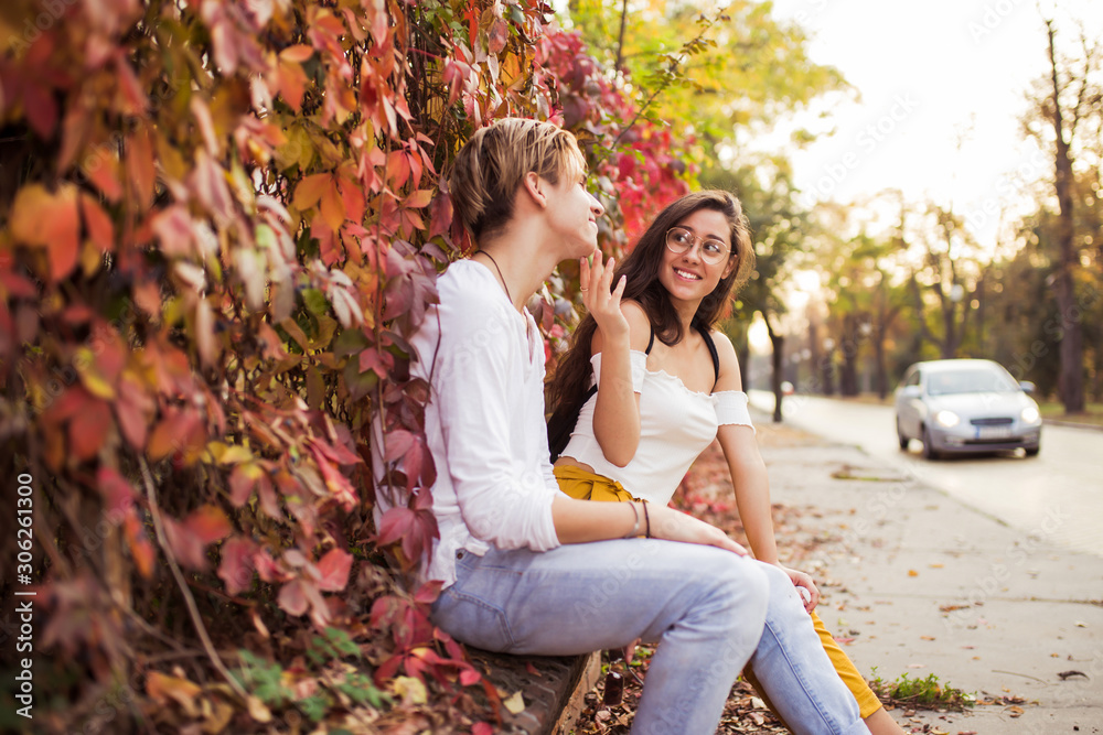 Beautiful young couple talking and enjoying on the first date Beautiful young couple talking and enjoying on the first date