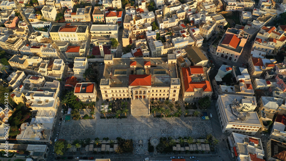 Aerial drone photo of iconic landmark neoclassical city hall building in main town of Syros or Siros island - Miaouli square, Ermoupolis, Cyclades, Greece