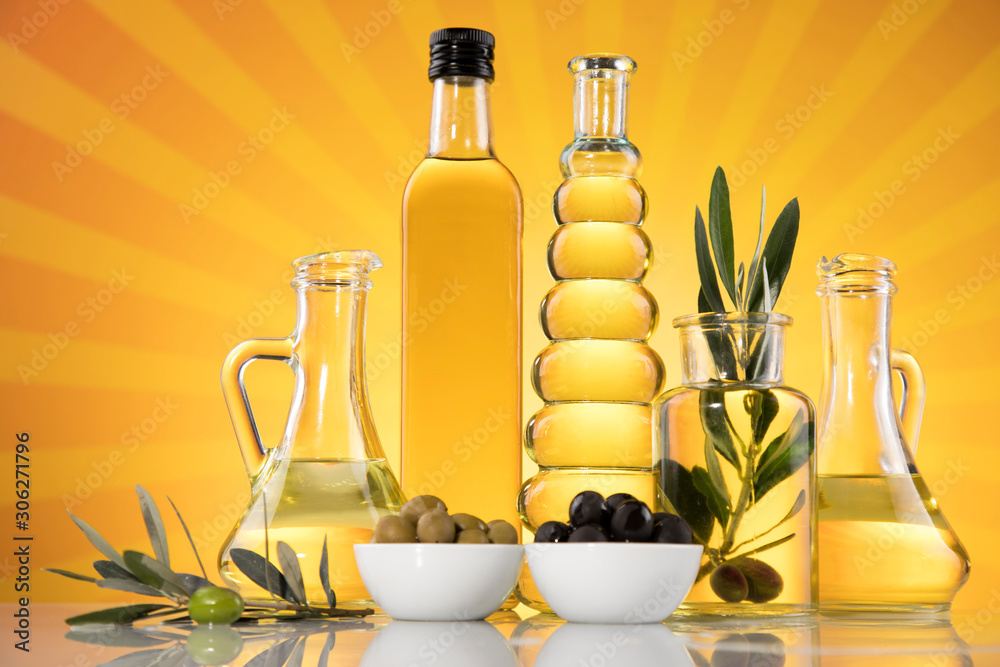 Olive oil bottles, olive branch and Cooking oils Olive oil bottles, olive branch and Cooking oils