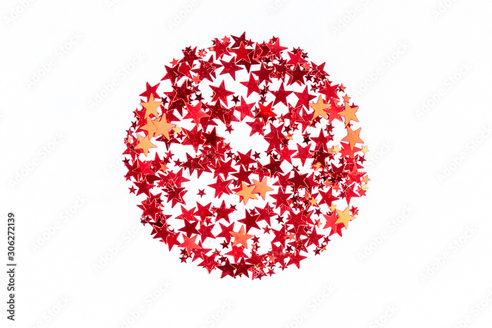 Red stars glitter confetti round shaped on white background. Festive backdrop. Red stars glitter confetti round shaped on white background. Festive backdrop.