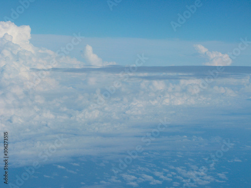 View of clouds in the sky from an airplane