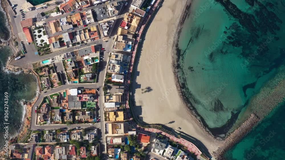 Vertical aerial top shot over Cape Palos Spain mar Menor la Manga residential houses and leisure harbour 