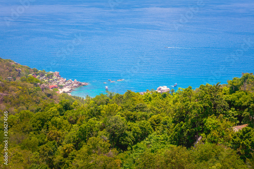 Wallpaper Mural Natural Landscape View of Stone Mountain and Tropical Beach against Blue Sky and Clouds Torontodigital.ca