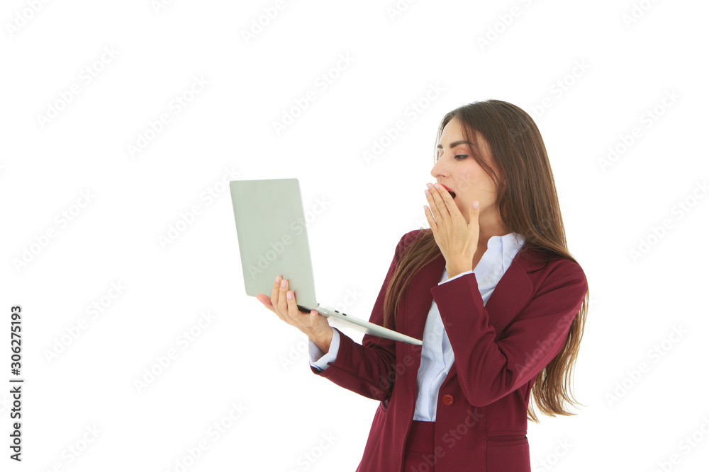 Beautiful woman in red dress holding laptop on right hand and left hand touching mouth isolated on white background - working and business woman concept Beautiful woman in red dress holding laptop on right hand and left hand touching mouth isolated on white background - working and business woman concept