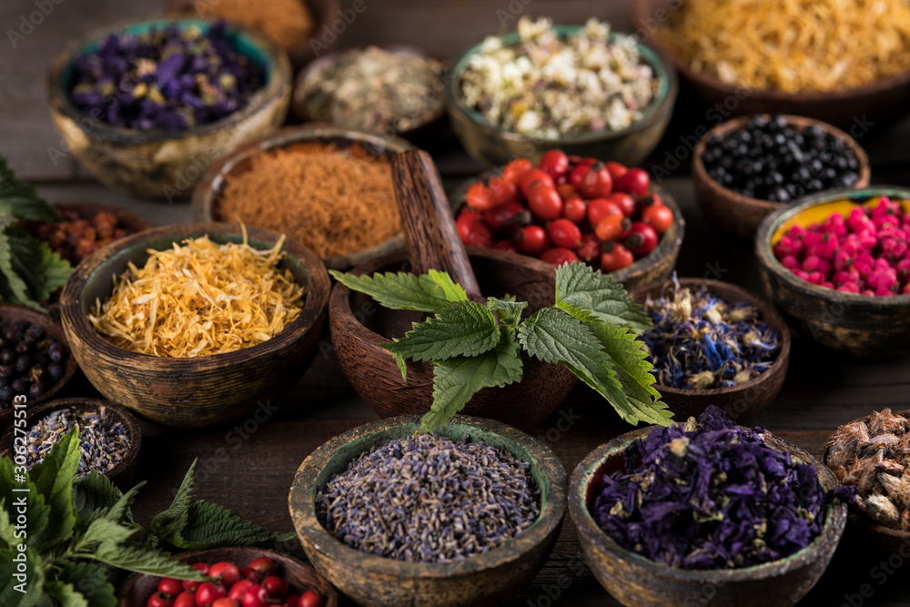 Natural remedy,Herbal medicine and wooden table background Natural remedy,Herbal medicine and wooden table background