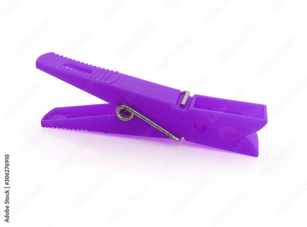 Isolated green plastic clothespin on white background. Isolated green plastic clothespin on white background.