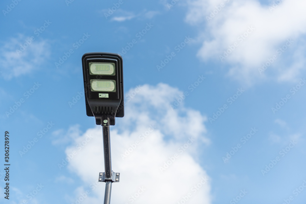 Solar cell smart street lamp with blue sky background in day time,Street light in park,Lamp park. Solar cell smart street lamp with blue sky background in day time,Street light in park,Lamp park.