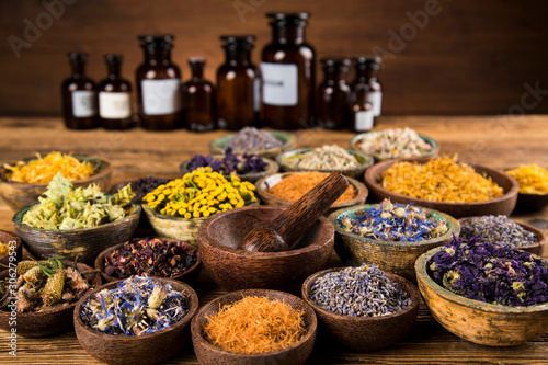 Natural remedy,Herbal medicine and wooden table background