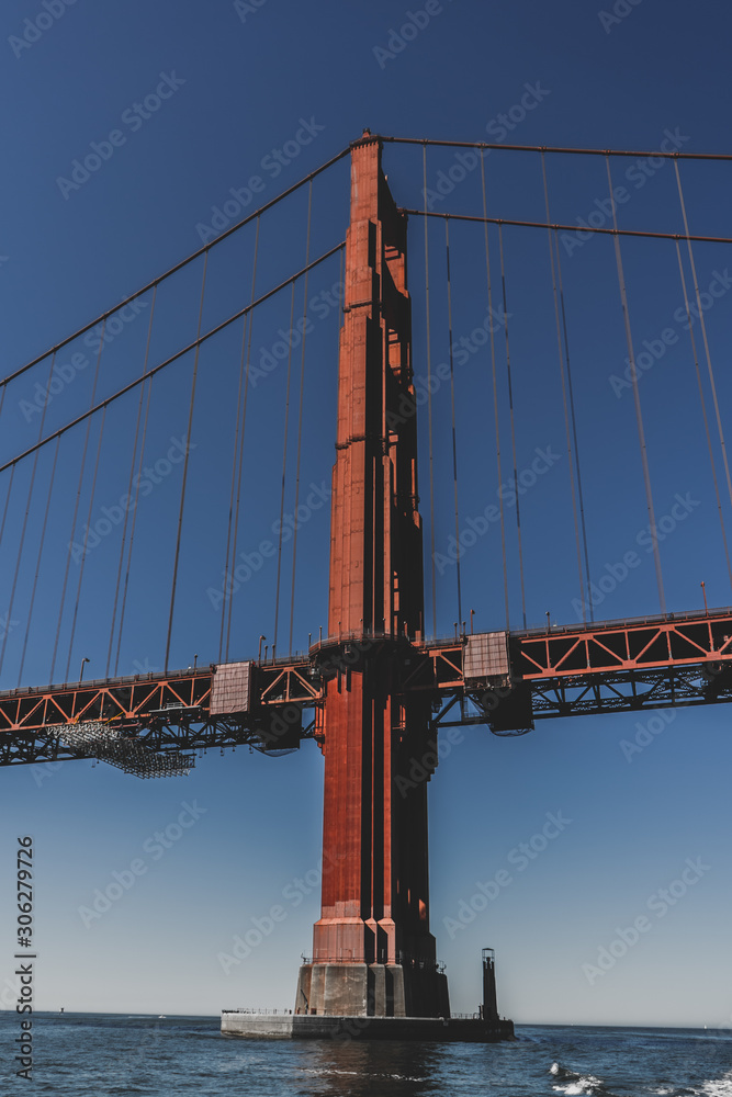 Fototapeta premium Golden Gate Bridge tower from a boat , San Francisco