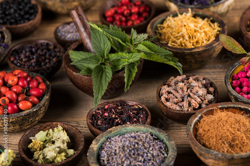 Herbs medicine and vintage wooden background © Sebastian Duda