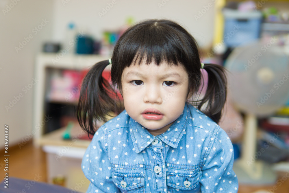 Bad moodconcept. The asian girl is in a bad mood. Bad moodconcept. The asian girl is in a bad mood.