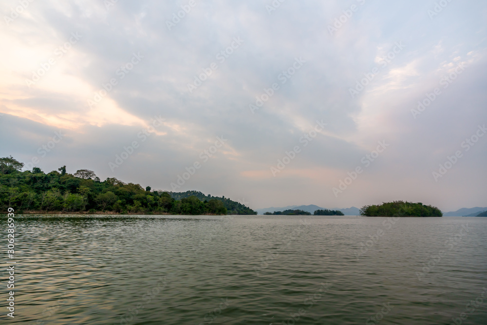 beautiful blue sky green forest mountains lake view at Kaeng Krachan National Park, Thailand.  an idea for backpacker hiking on long weekend or a couple, family holiday activity camping relaxing