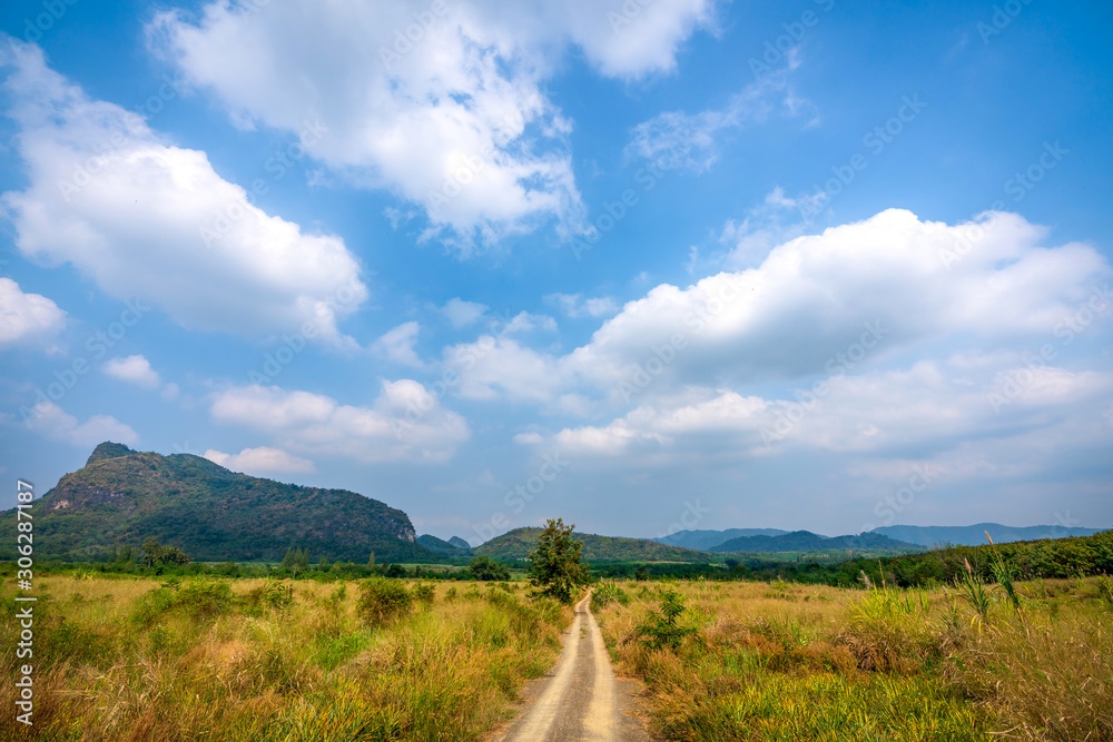 beautiful blue sky green forest mountains lake view at Kaeng Krachan National Park, Thailand. an idea for backpacker hiking on long weekend or a couple, family holiday activity camping relaxing beautiful blue sky green forest mountains lake view at Kaeng Krachan National Park, Thailand. an idea for backpacker hiking on long weekend or a couple, family holiday activity camping relaxing