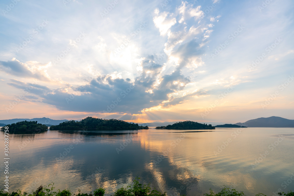 Fototapeta premium beautiful blue sky green forest mountains lake view at Kaeng Krachan National Park, Thailand. an idea for backpacker hiking on long weekend or a couple, family holiday activity camping relaxing