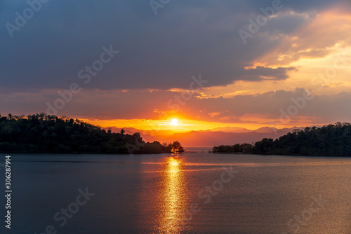 beautiful blue sky green forest mountains lake view at Kaeng Krachan National Park, Thailand.  an idea for backpacker hiking on long weekend or a couple, family holiday activity camping relaxing