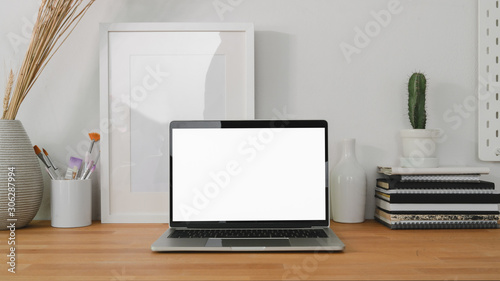 Wallpaper Mural Cropped shot of comfortable workplace with laptop computer and office supplies on wooden table background and white wall Torontodigital.ca