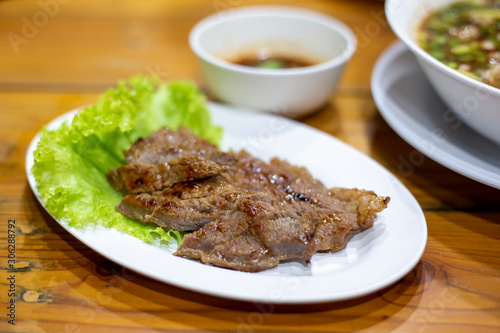 Beef roasted sliced in dish Thai traditional style.