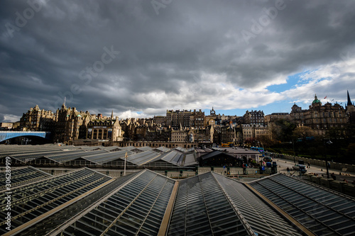 View of Edinburghs Market Street as seen from Waverly Station, with the stations glass ceiling in the foreground. Edinburgh, Scotland