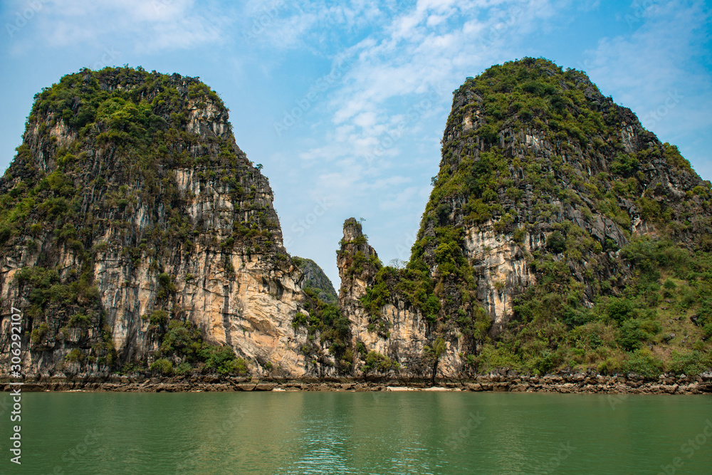Beautiful island landscape of Halong Bay the UNESCO world heritage site in Vietnam. The bay features thousands of limestone karsts in various shapes and sizes. 