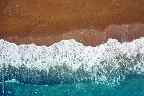 ocean wave on a sandy beach