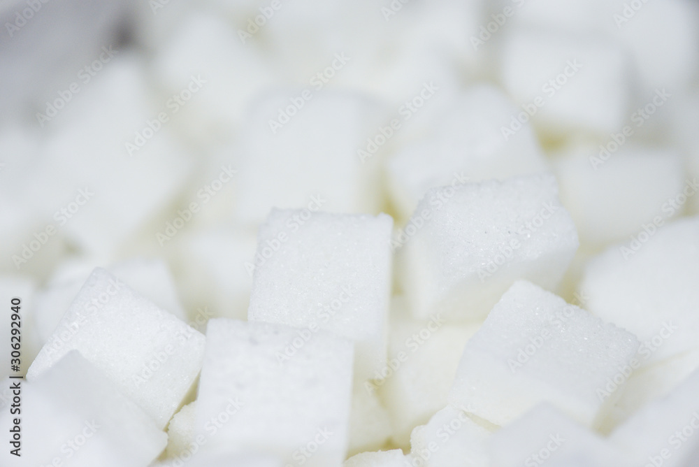 Close up of white sugar , top view / Sugar cubes texture background Close up of white sugar , top view / Sugar cubes texture background