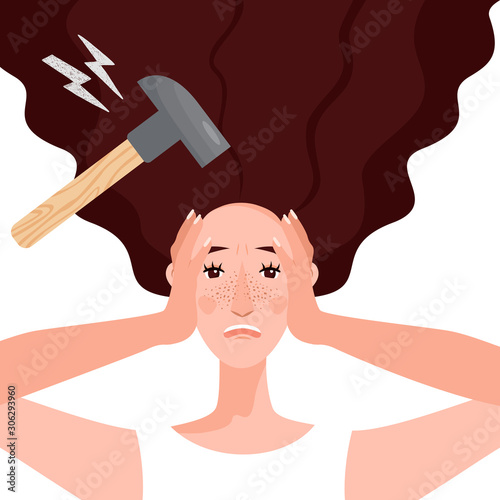 A young woman suffers from a severe headache, pressing her hand to her forehead. Migraine constantly caused by depression, stress, and nerves from work. An invisible hammer hits the poor girl’s temple