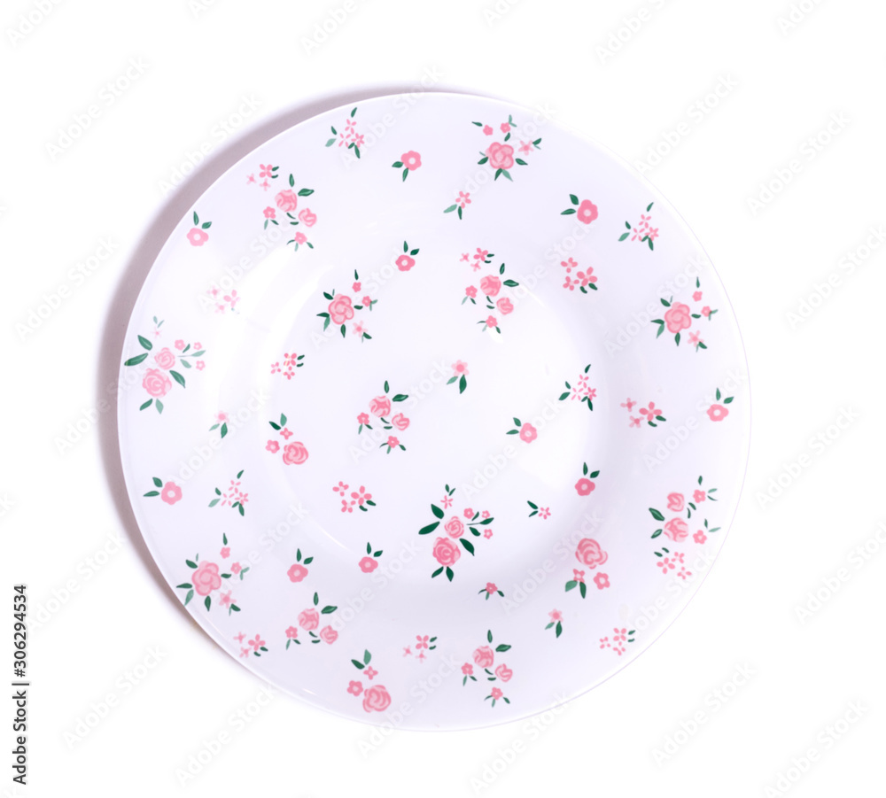 empty white plate in a flower on a white background top view