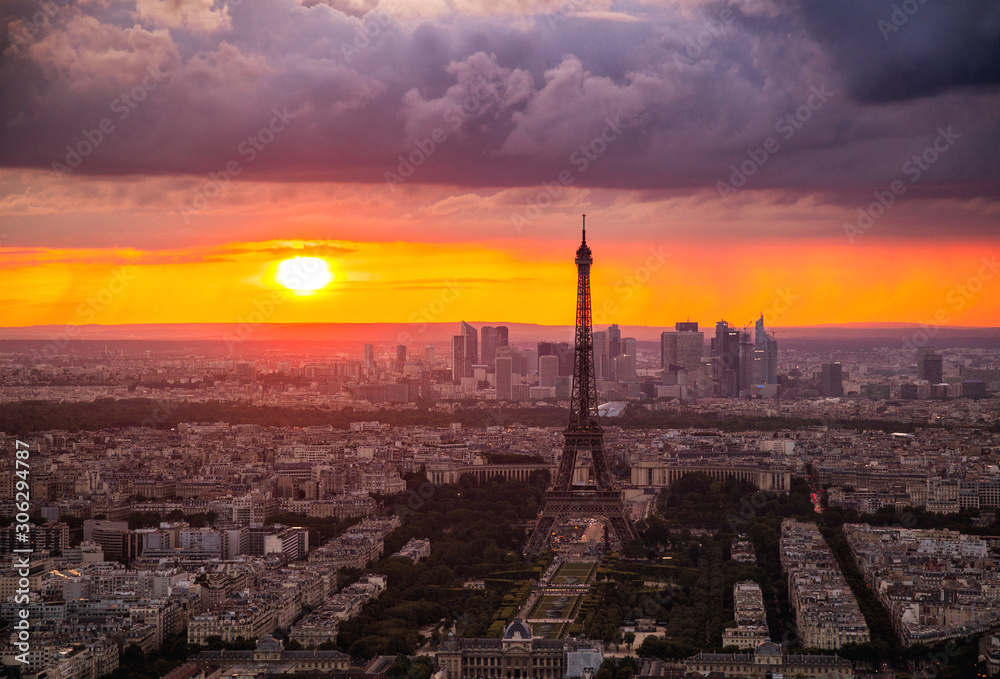 Sun setting behind the Eiffel Tower