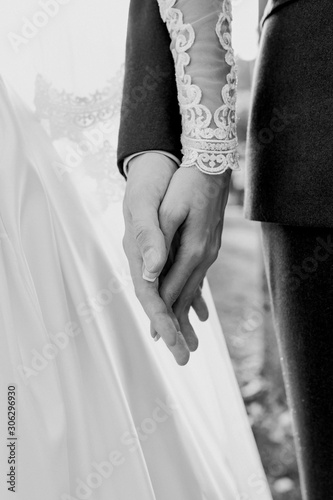 hands of wedding couple  in love. Relationship, love and tenderness concept