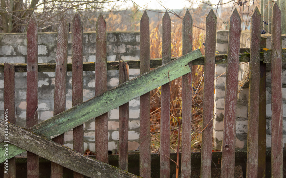 Old wooden boards on the fence as a background Old wooden boards on the fence as a background