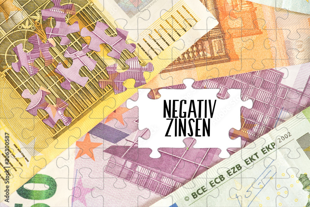 Puzzle aus Euro Geldscheinen und Negativzinsen Puzzle aus Euro Geldscheinen und Negativzinsen