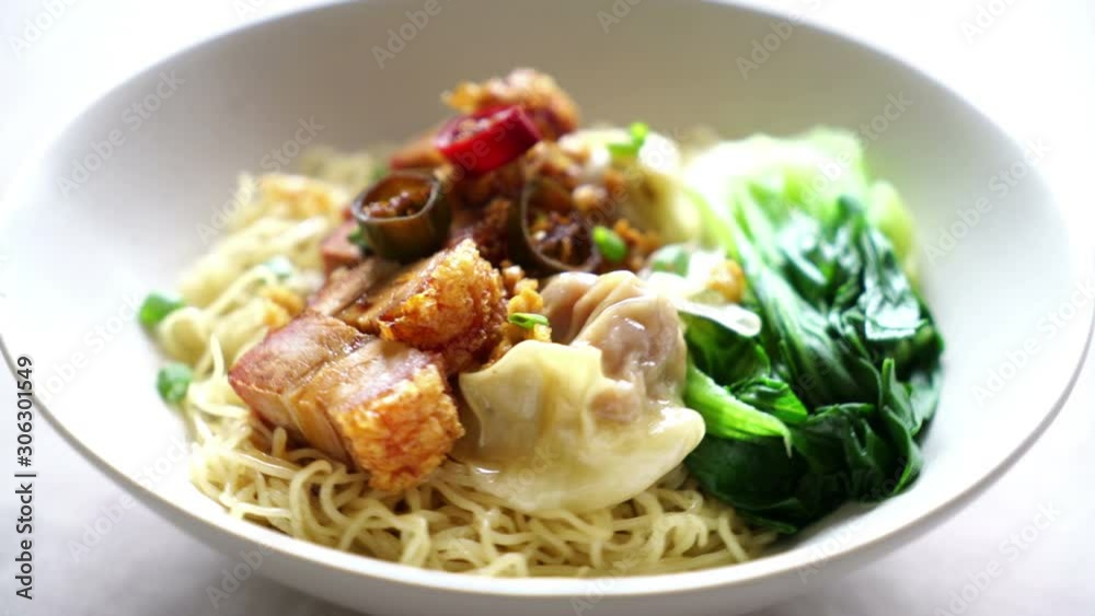 egg noodle with crispy pork belly and wonton egg noodle with crispy pork belly and wonton